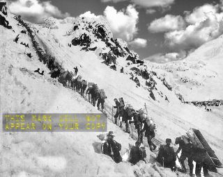 Klondike gold rush miners crossing the Chilkoot Pass in 1897
