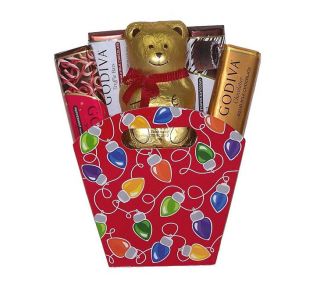 an assortment of Godiva Chocolate Bars and a Lindt Chocolate Bear