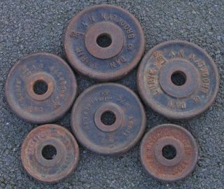18 pounds of vintage Dan Lurie weight plates 2 each of 5 , 2.5 , and