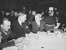 Marvin H. McIntyre( r ) at a luncheon for the second anniversary of