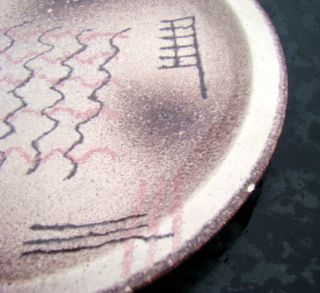 are darker than they appear in photos. Shallow 1/8 glaze chip at rim