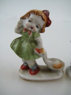 Porcelain Girl Duck Boy and Rabbits Occupied Japan Figural Figurine