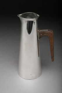 silver pitcher from Germany. Tapered design with a slightly flared rim