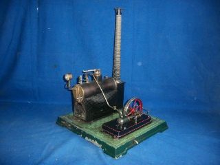 396) uraltes Dampfmaschine aus Blech Sockel ca. 35,5